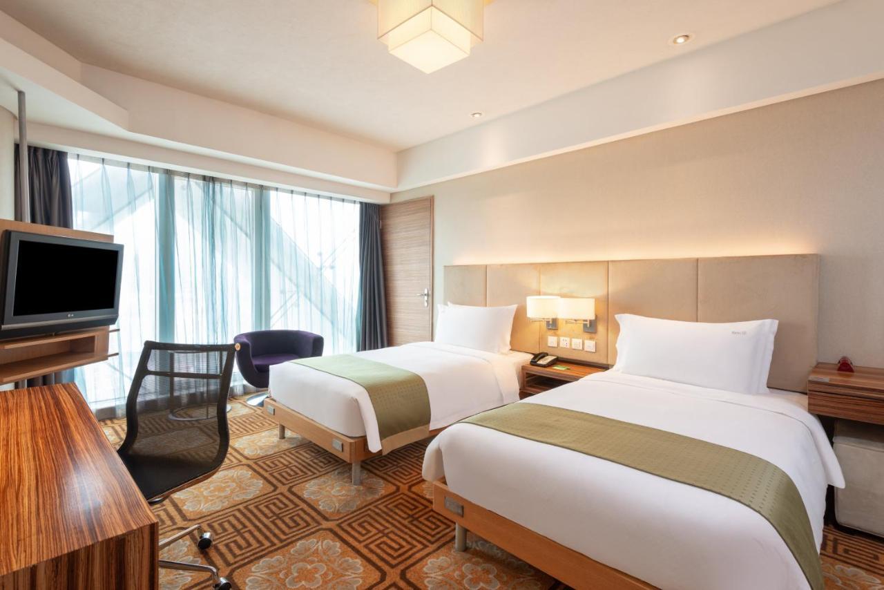 Holiday Inn Binhai Tianjin Chambre photo